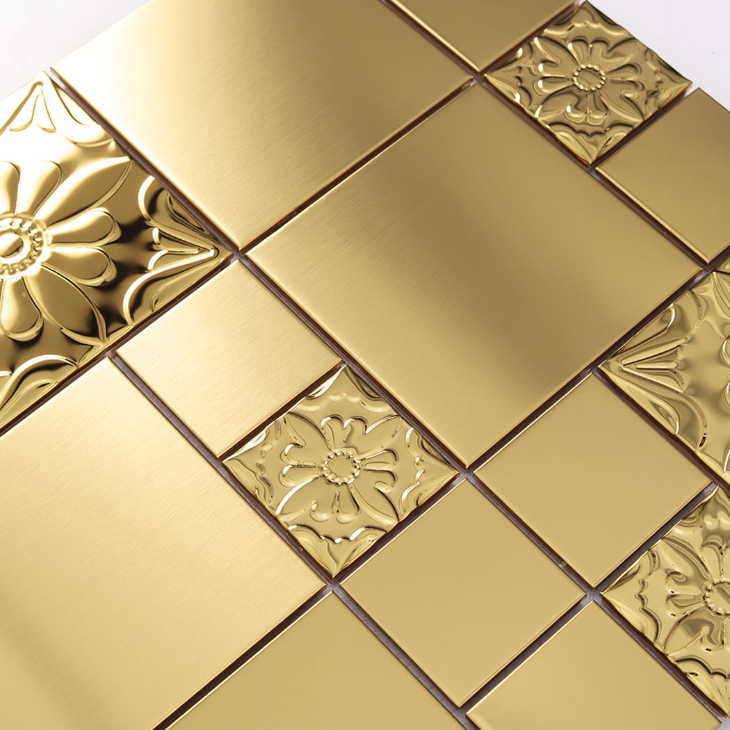 Detail of gold stainless steel mosaic tile combining brushed panels and embossed