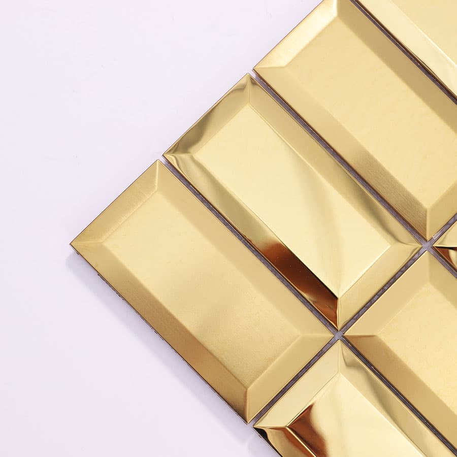 Close up of gold stainless steel rectangular mosaic tile surface