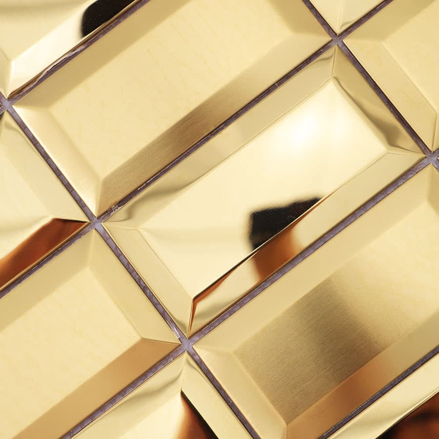 Glossy detail of gold stainless steel rectangular mosaic tile