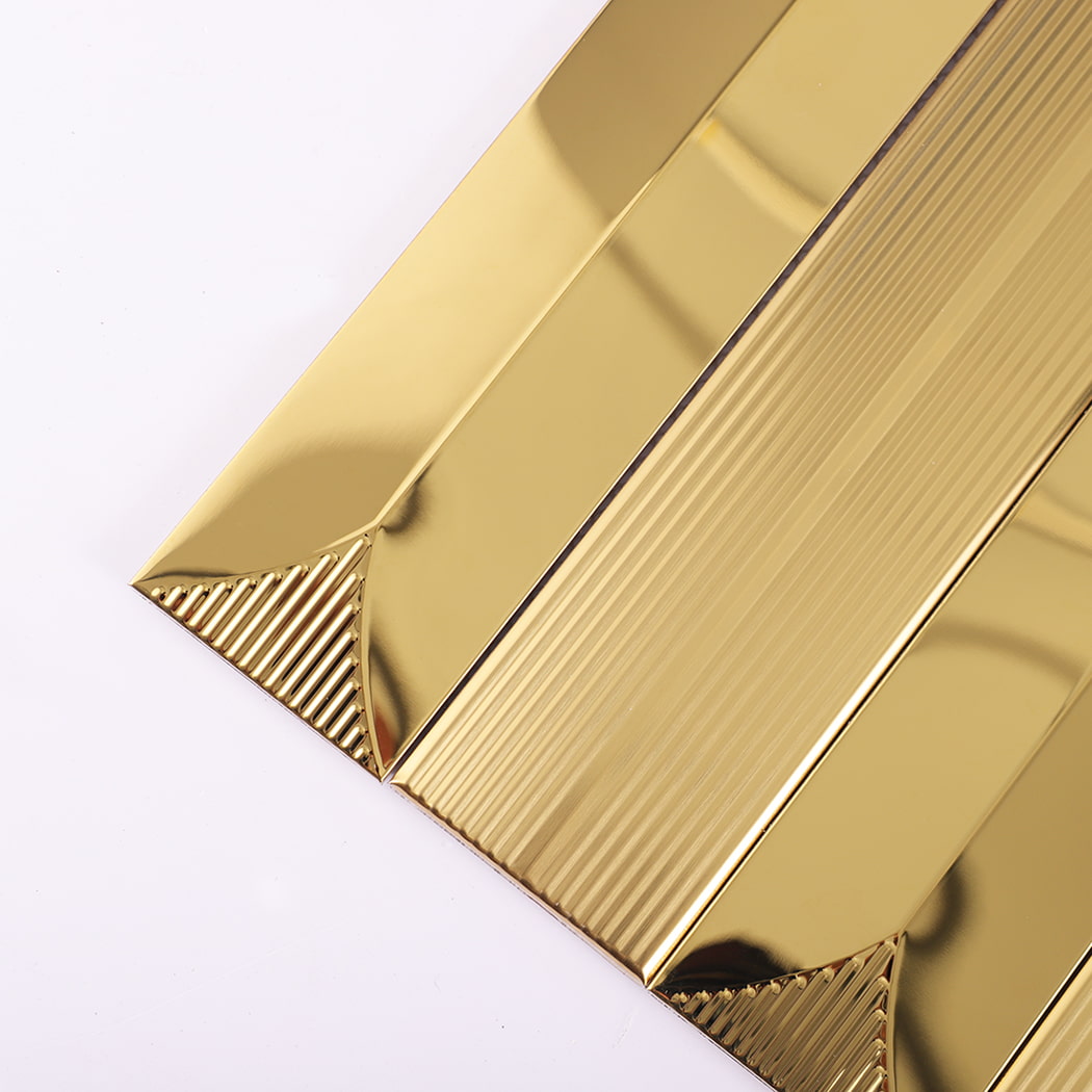 Close-up of corner showing gold wall tile texture and reflection