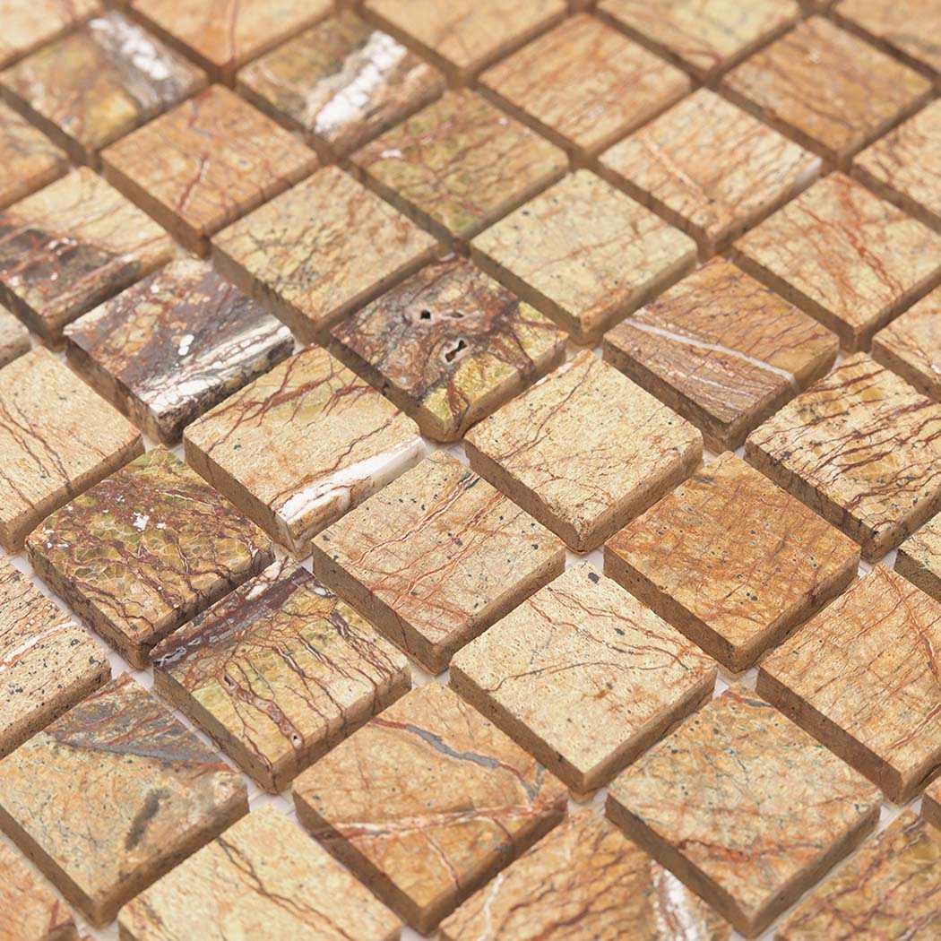 Detailed view of golden brown marble square mosaic tile surface