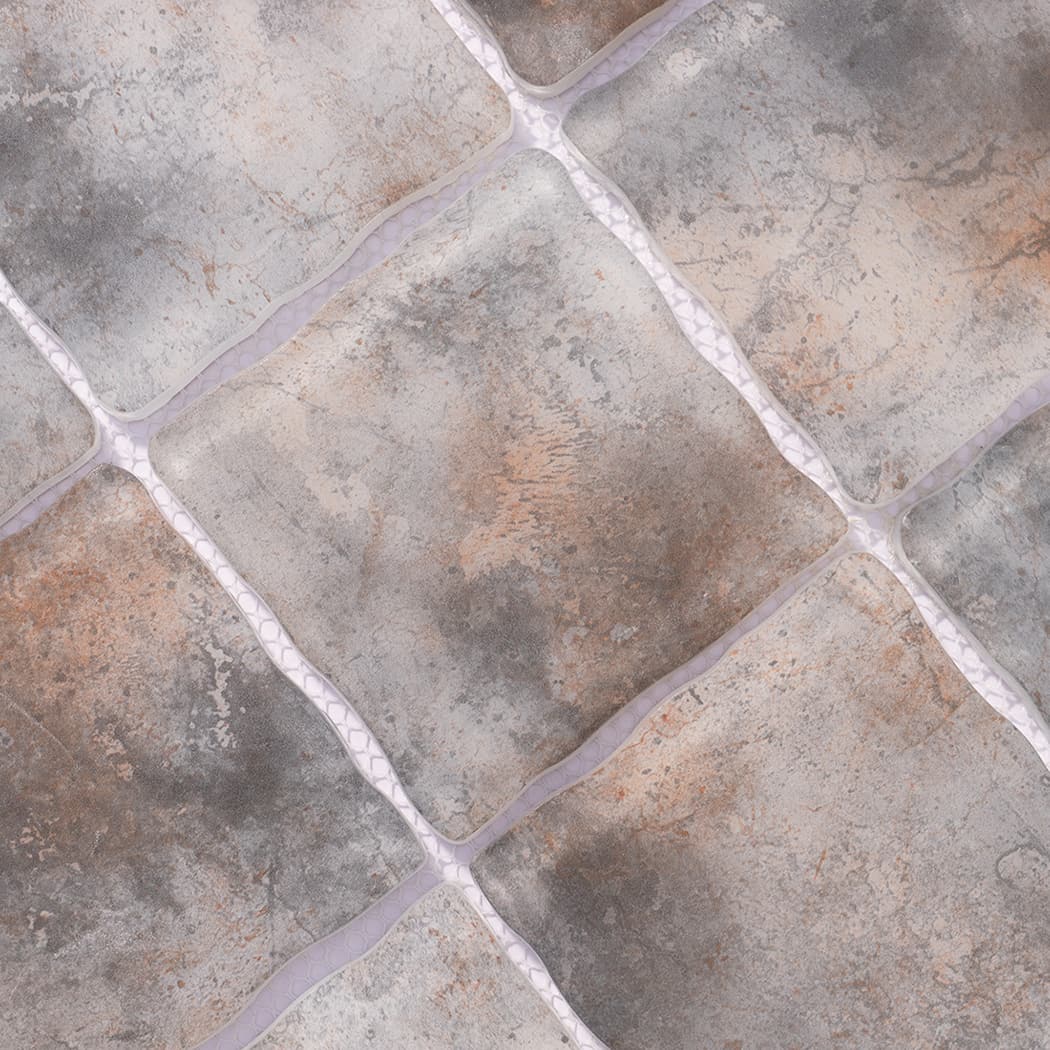 Surface detail of gray brown wavy square glass mosaic tiles