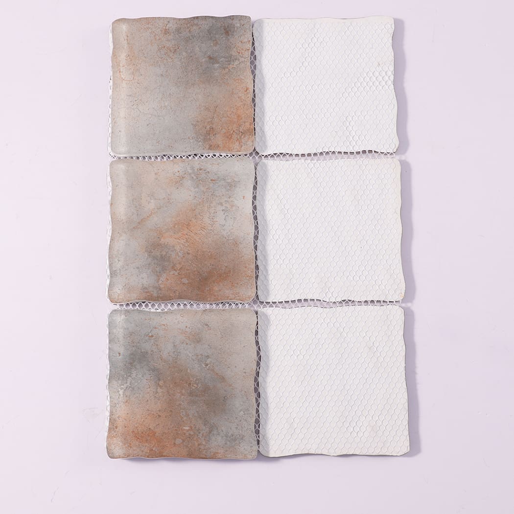 Back view of gray rust orange wavy square glass mosaic tiles with mesh backing