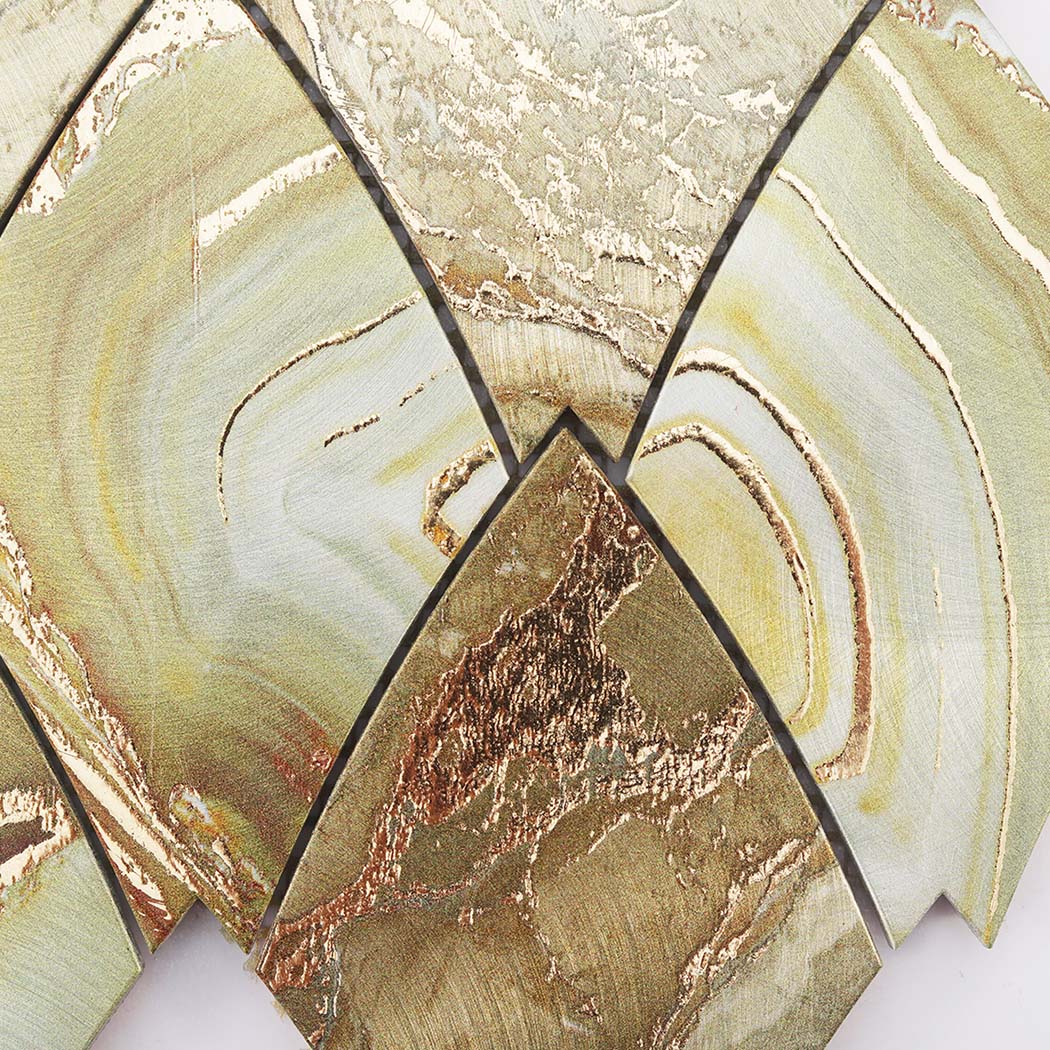 Close-up of green gold feather aluminum mosaic tile pattern with marble look texture