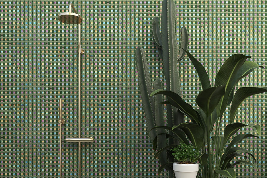 Close-up view of iridescent green shower tiles in a modern bathroom