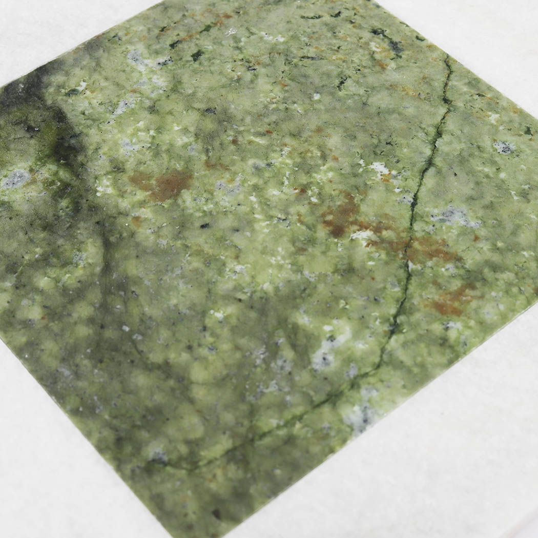 Green marble center detail in white border mosaic tile