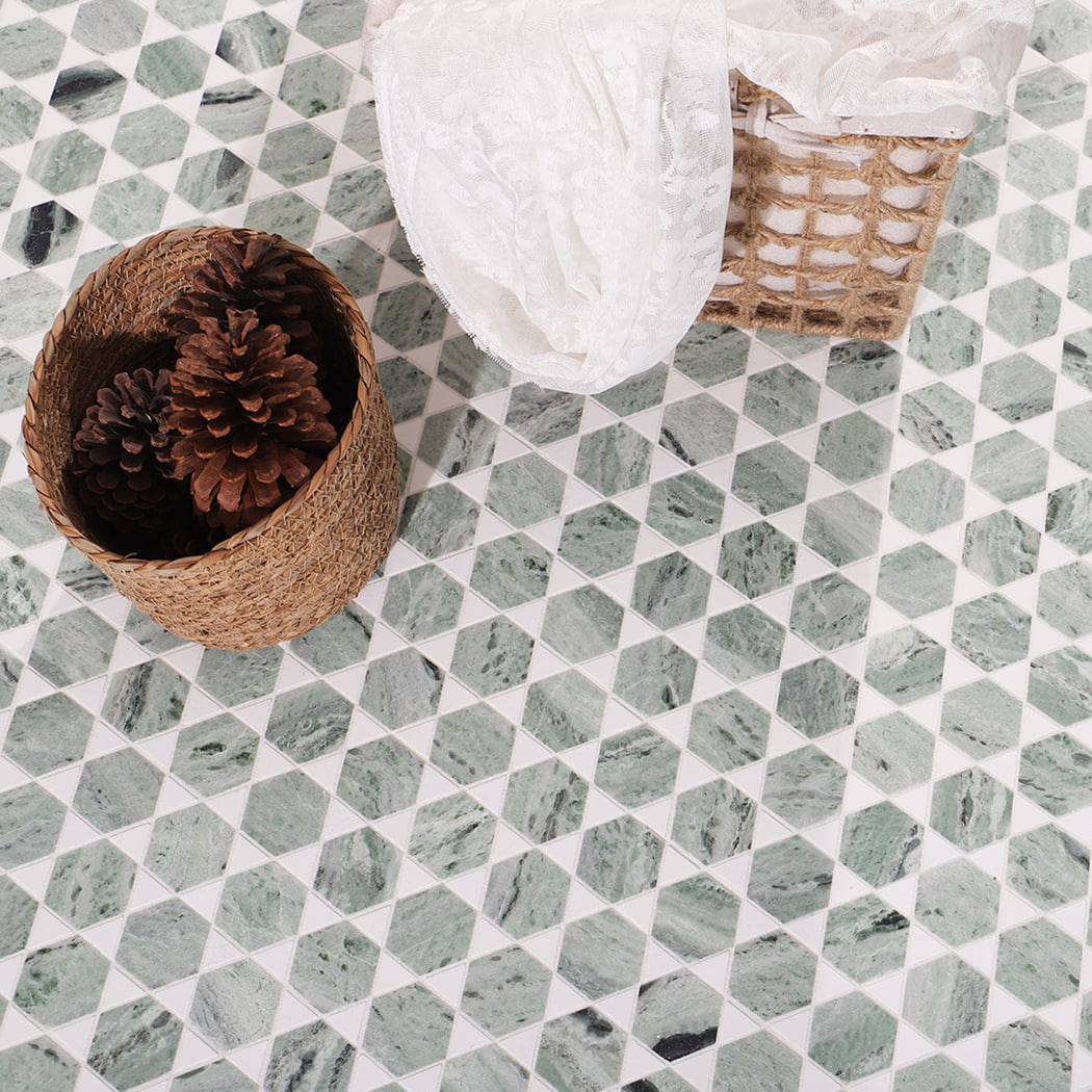 Green marble mosaic floor with basket and decorative fabric