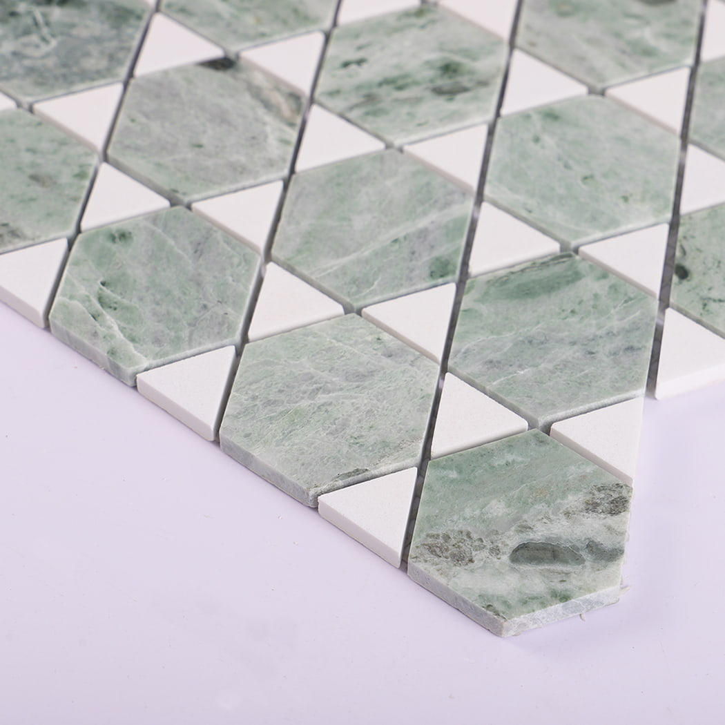 Angled view of green marble mosaic showing texture and polish