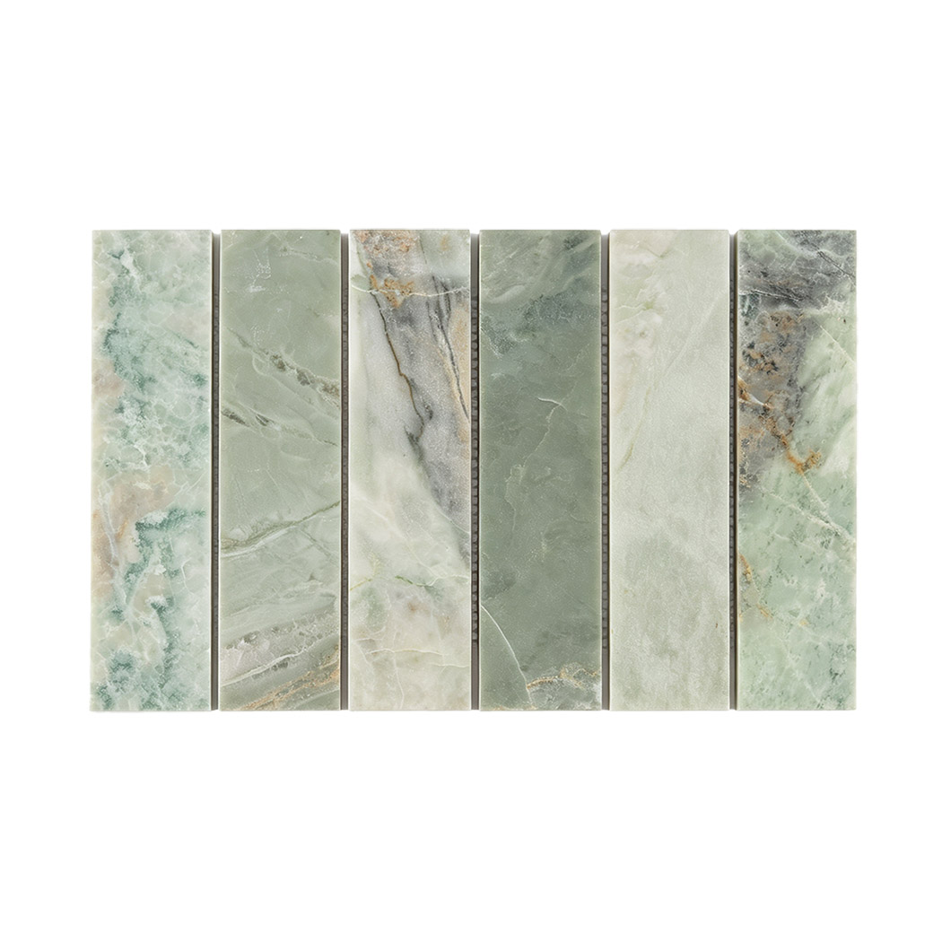 Front view of green marble strip tile with soft sage tones and natural veining