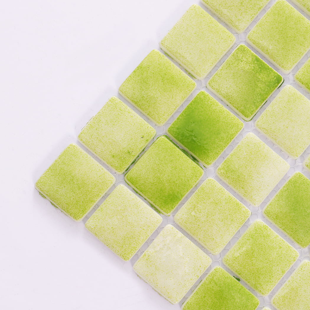Close up of green recycled glass mosaic tiles from corner angle