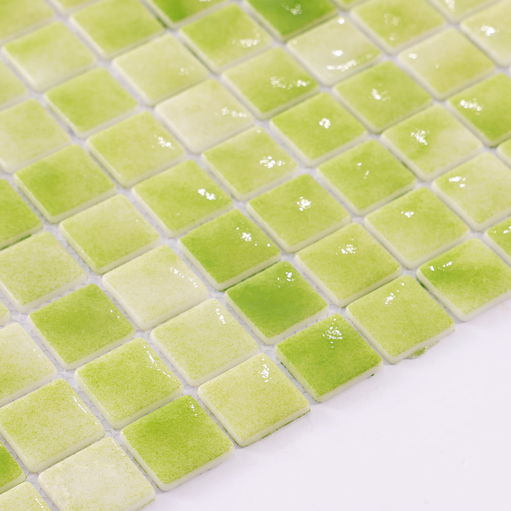Surface close up of glossy green recycled glass mosaic tiles