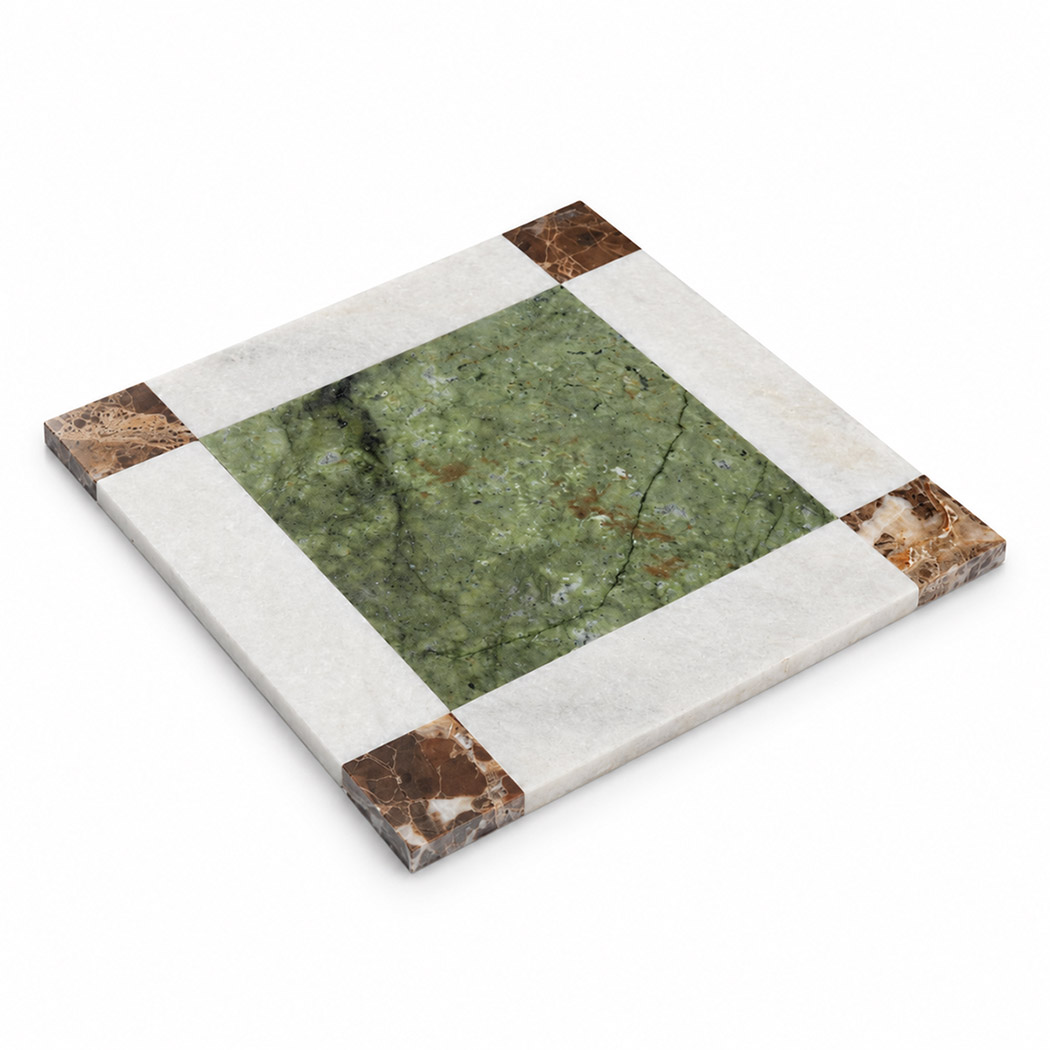 Angled view of green and white marble border mosaic tile