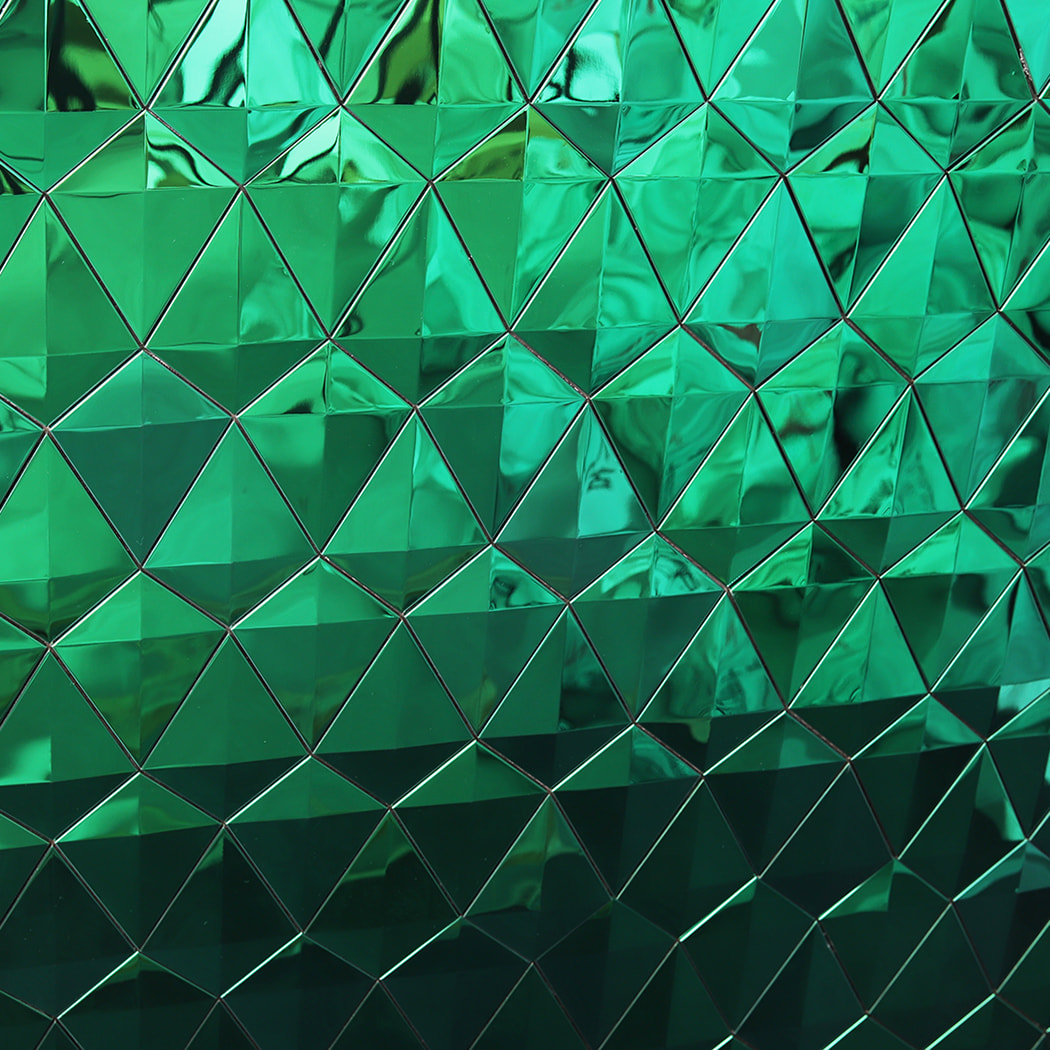 Close up of green diamond mirror stainless steel mosaic tile wall texture