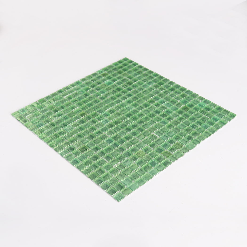 Three quarter perspective view of green glass square mosaic tile sheet