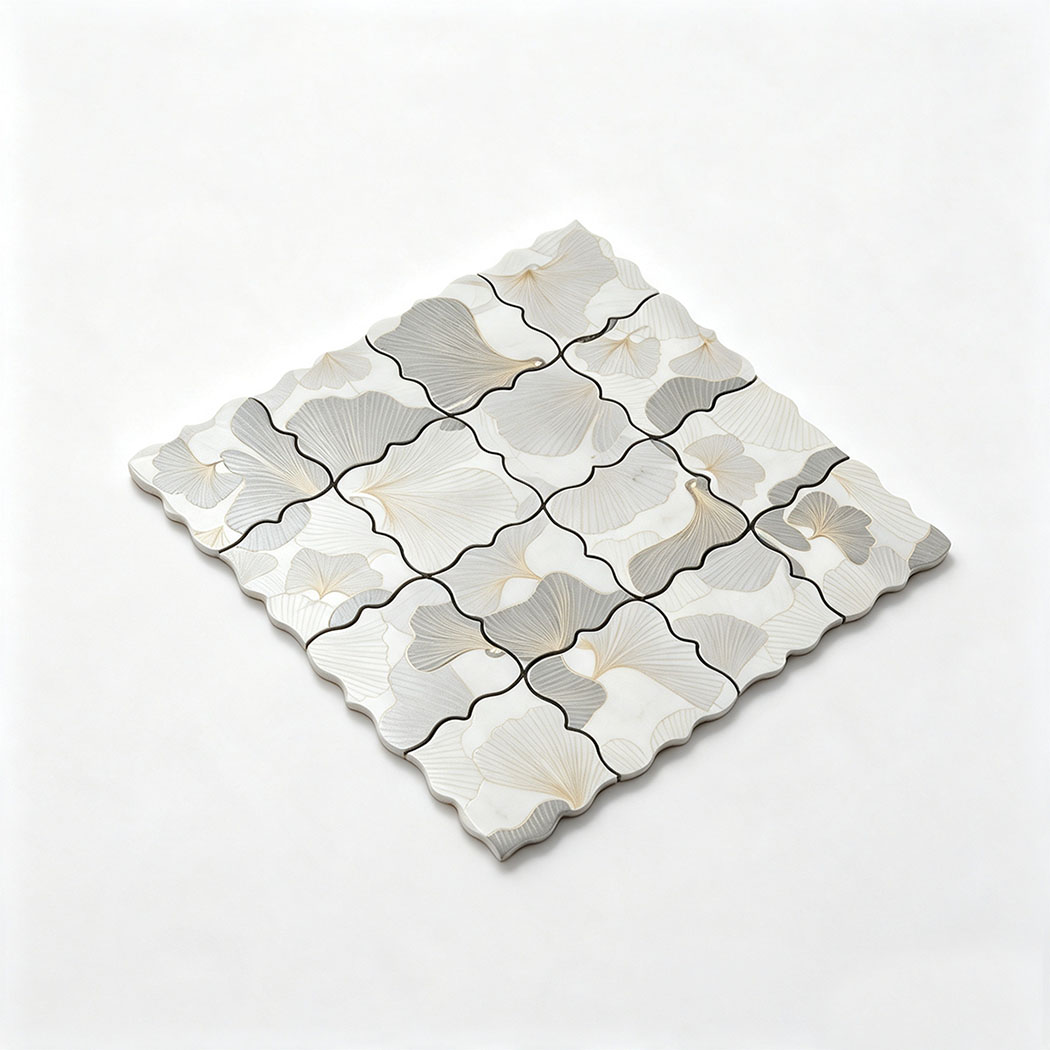 Angled view of grey and silver floral aluminum mosaic tile sheet