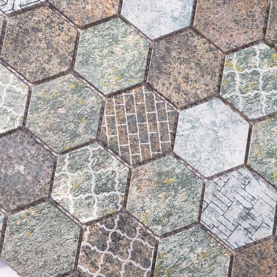 Macro view of hexagonal mosaic tiles with rustic stone textures and embossed graphic patterns.
