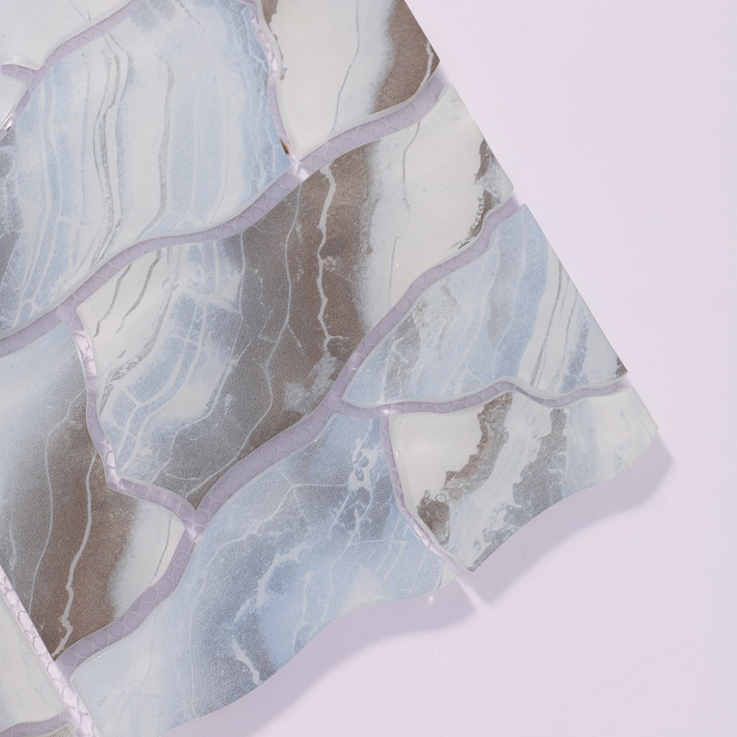 Close-up of ice blue brown irregular glass mosaic tiles with fine veining