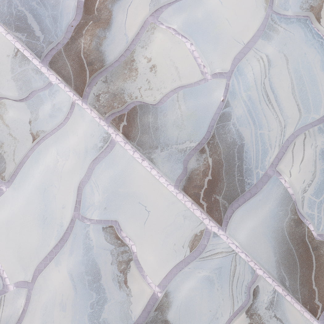 Detailed view of ice blue brown irregular glass mosaic tiles on mesh backing