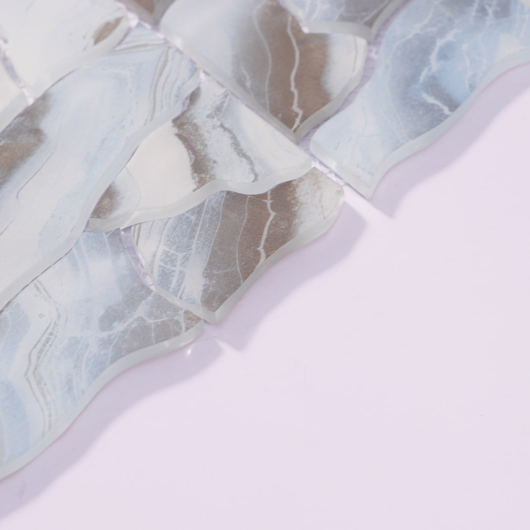Angled view of ice blue brown irregular glass mosaic tiles with smooth edges