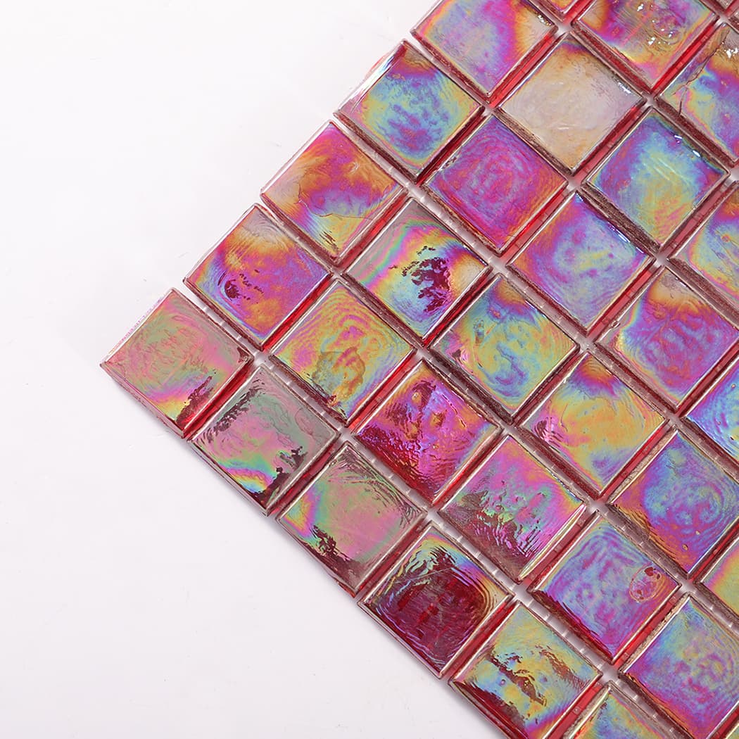 Close up of a corner of iridescent glass mosaic tiles with glossy finish