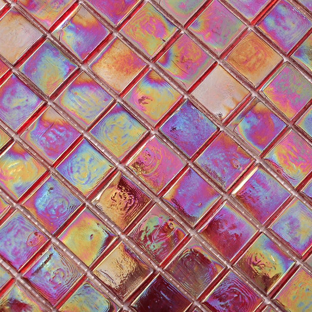 Detailed close up of iridescent square glass mosaic tiles showing color shifts