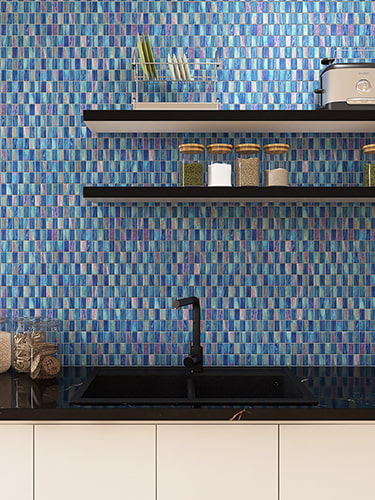 Close-up of iridescent glass tiles, adding a sophisticated touch to a modern kitchen