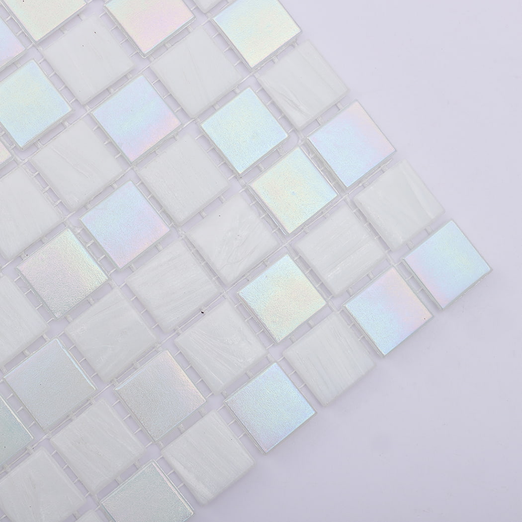 Corner closeup of iridescent and frosted white glass mosaic squares