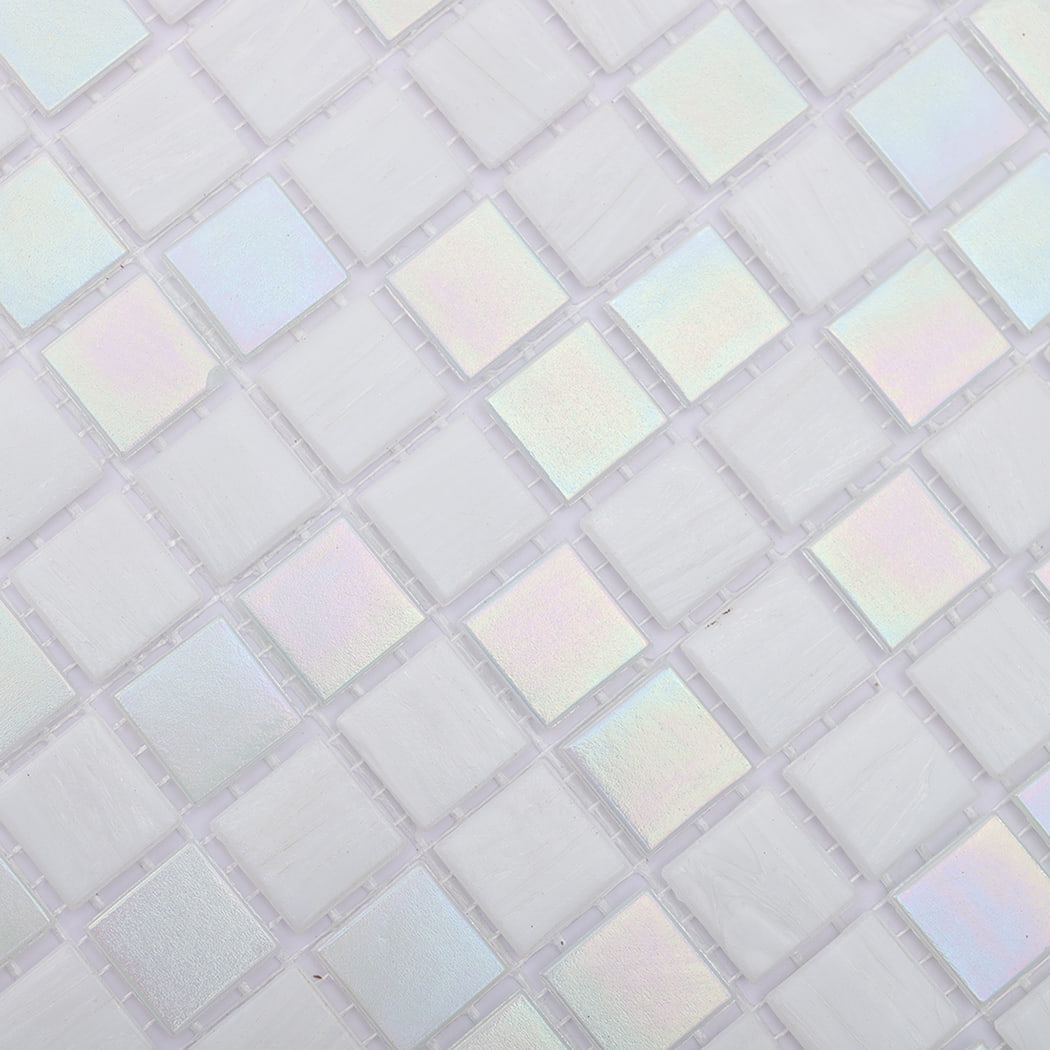 Closeup of mixed iridescent and matte white square glass mosaic tiles