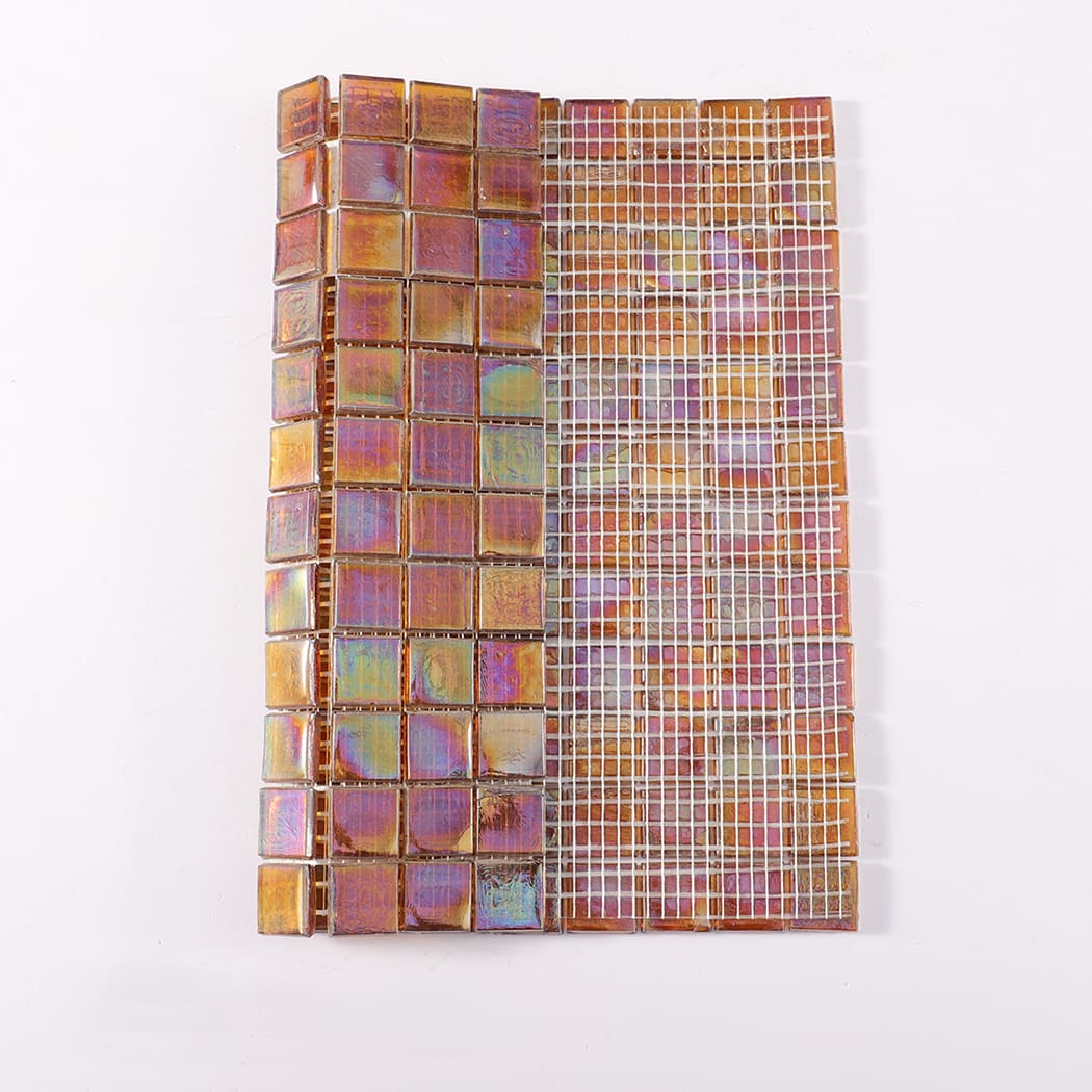 Mosaic tile sheet showing iridescent amber tiles and mesh backing.