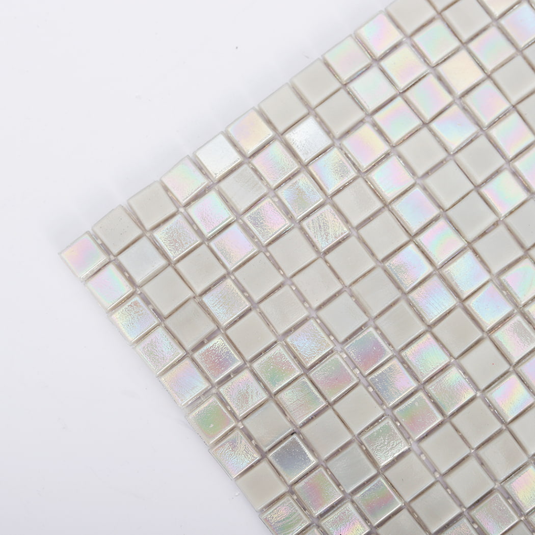 Close-up corner detail of iridescent light gray water glass square mosaics