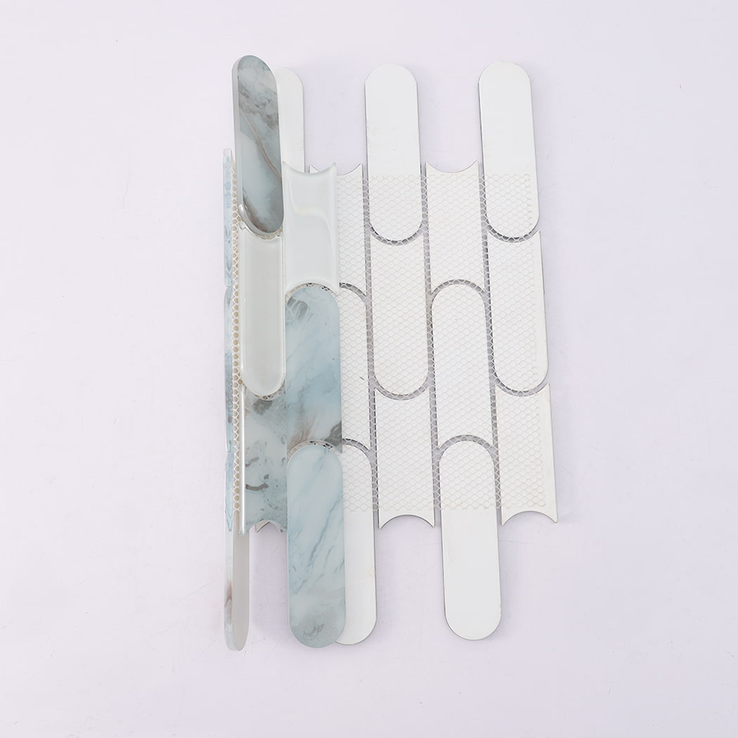Side view of light blue beige and white pill shaped glass mosaic tile on mesh