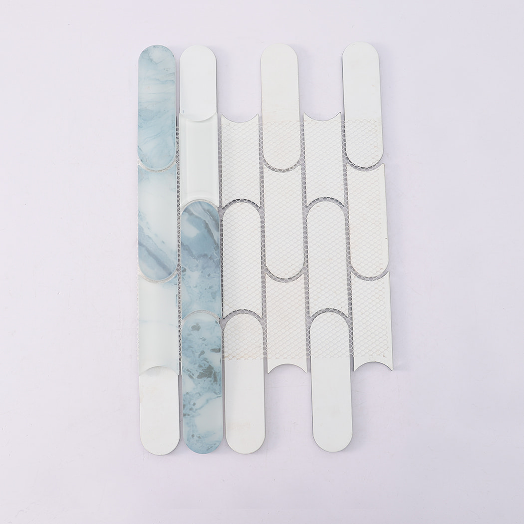 Back view of light blue and white rounded linear glass mosaic tile on mesh