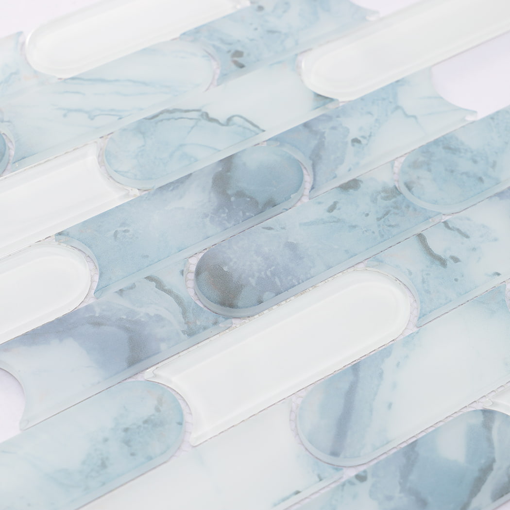 Light blue and white rounded linear glass mosaic tile surface detail