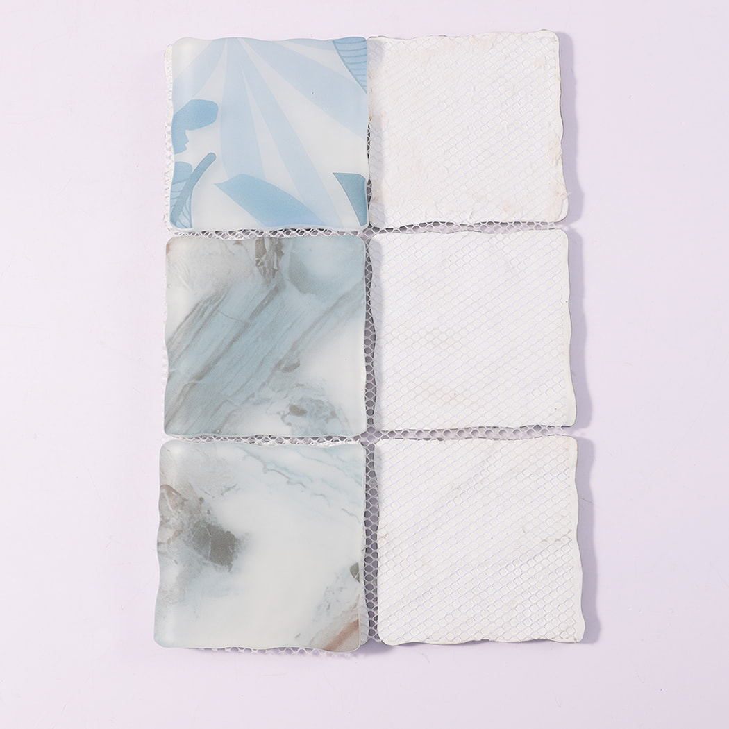 Back view of light blue white wavy square glass mosaic tiles with mesh backing