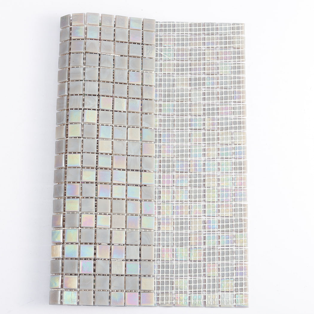 Back view of iridescent light gray square glass floor tile showing mesh backing structure