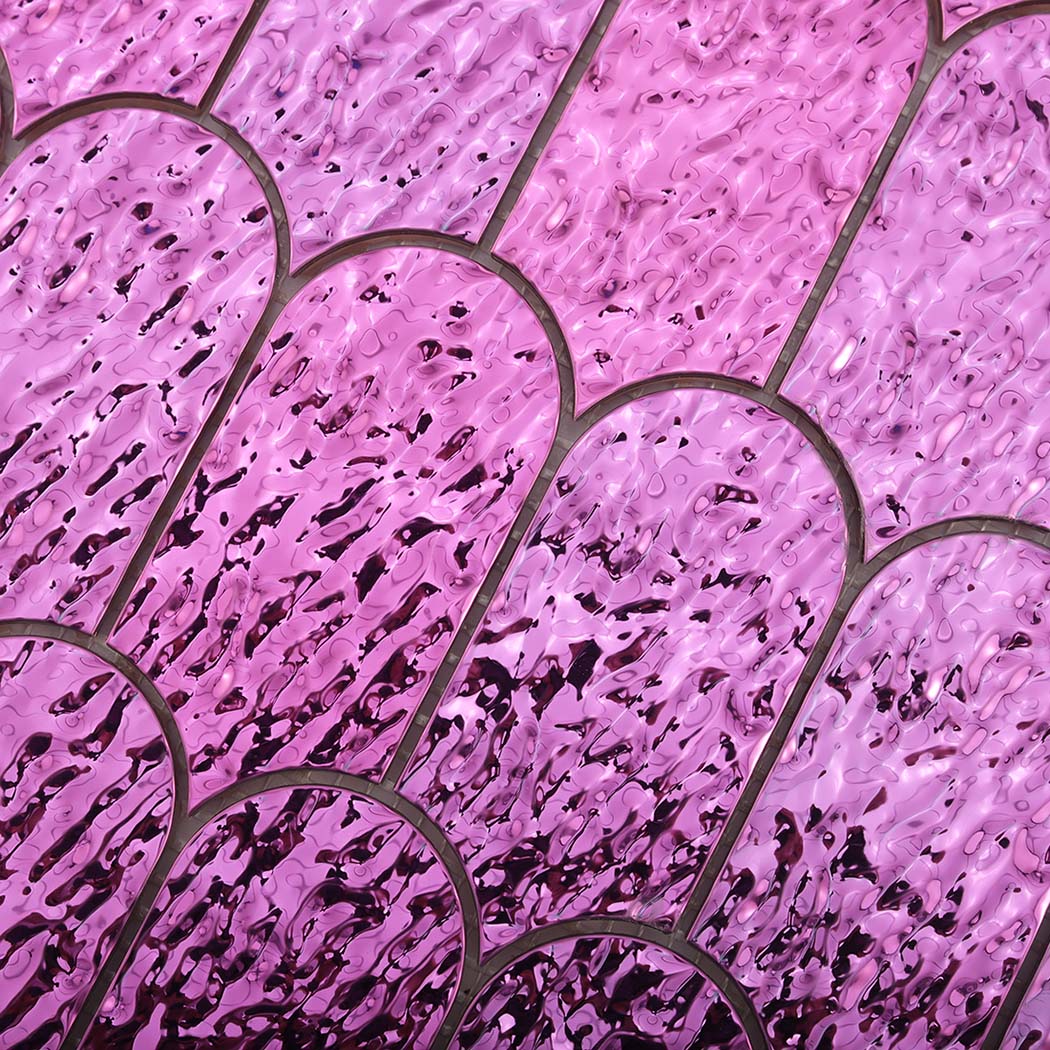 Detailed view of glossy lilac water ripple scallop metal tile texture