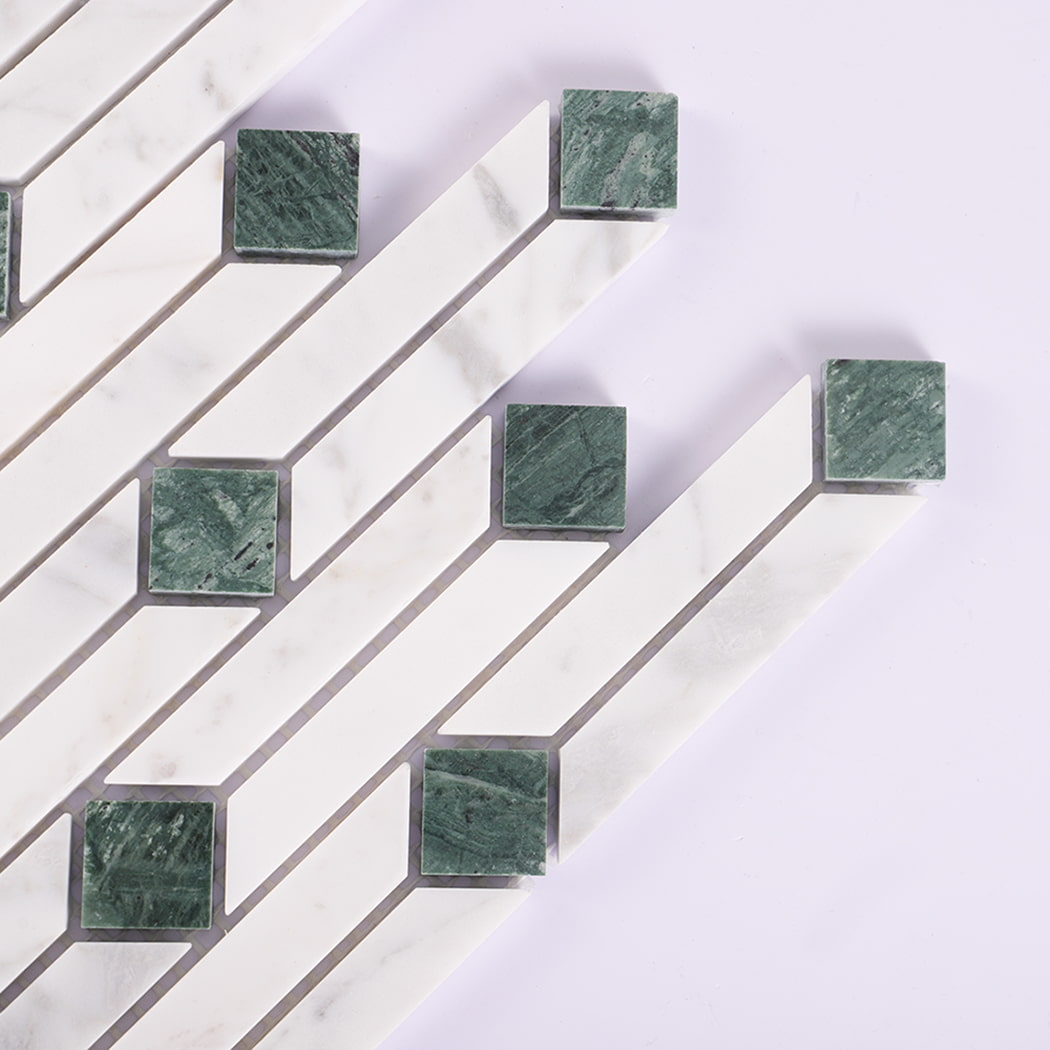 Close up of marble mosaic tile showing texture and green squares