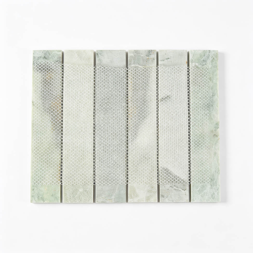 Back view of green marble strip tile sheet with mesh mounting for installation