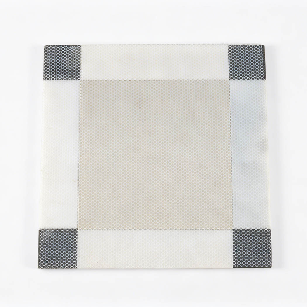 Mesh backed square marble floor medallion with black corner accents