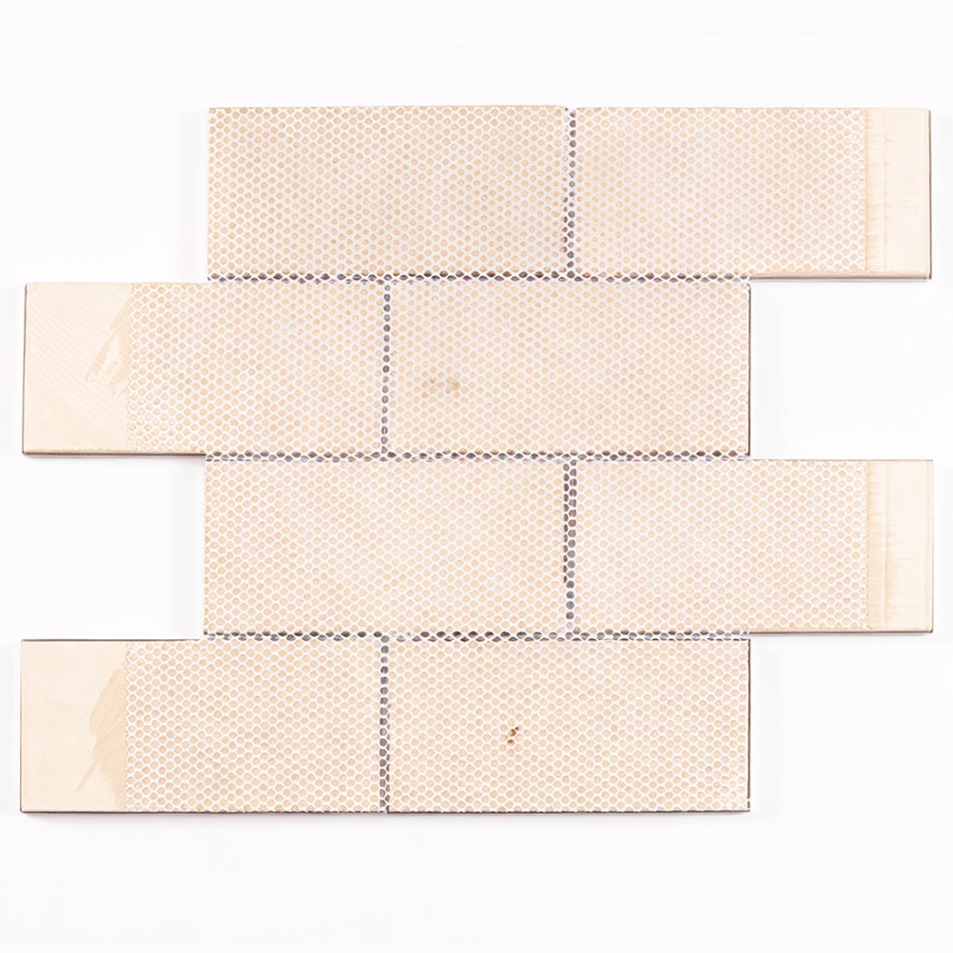 Back view of mesh mounted stainless steel subway tile sheet