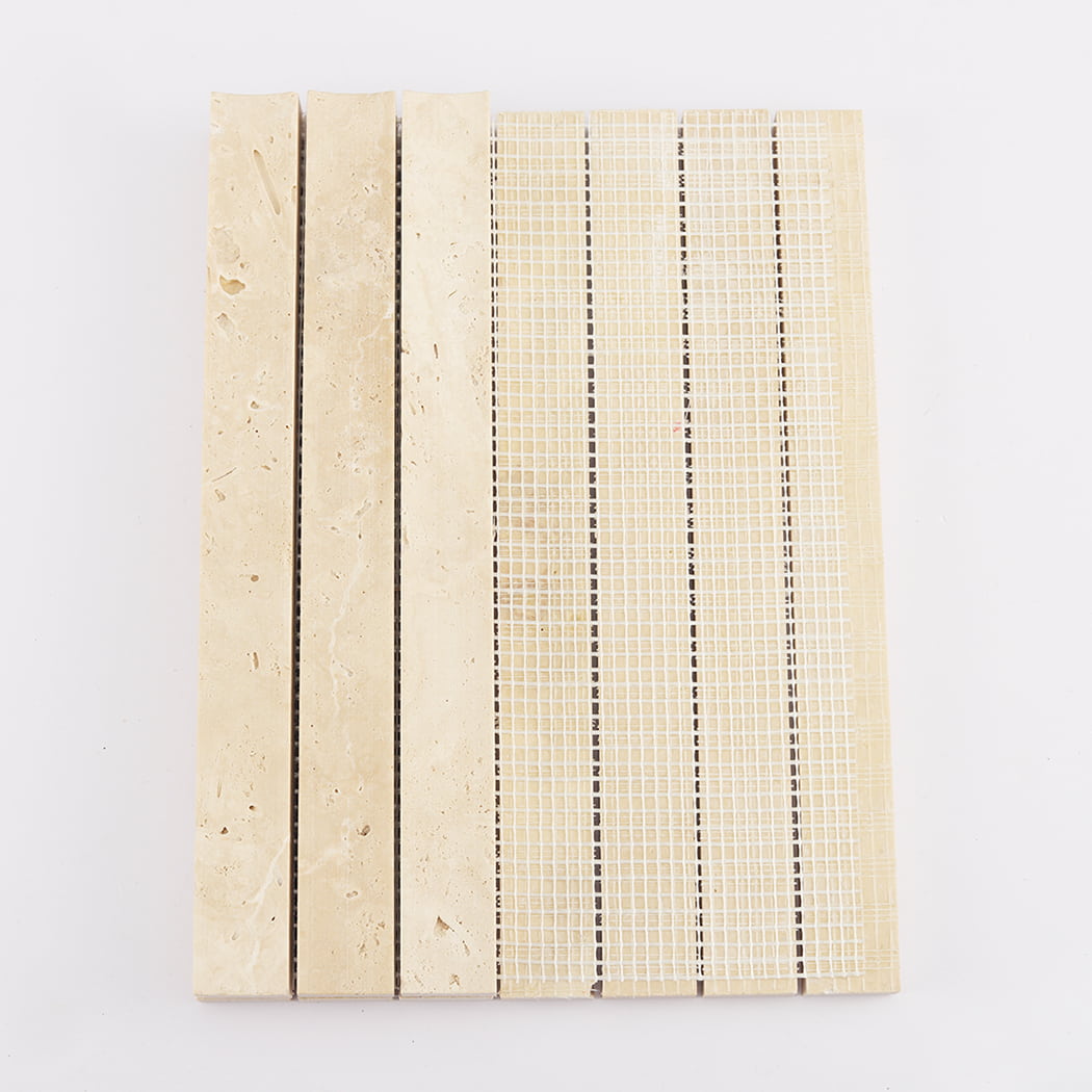 Back view of the travertine mosaic sheet showing the white mesh mounting.