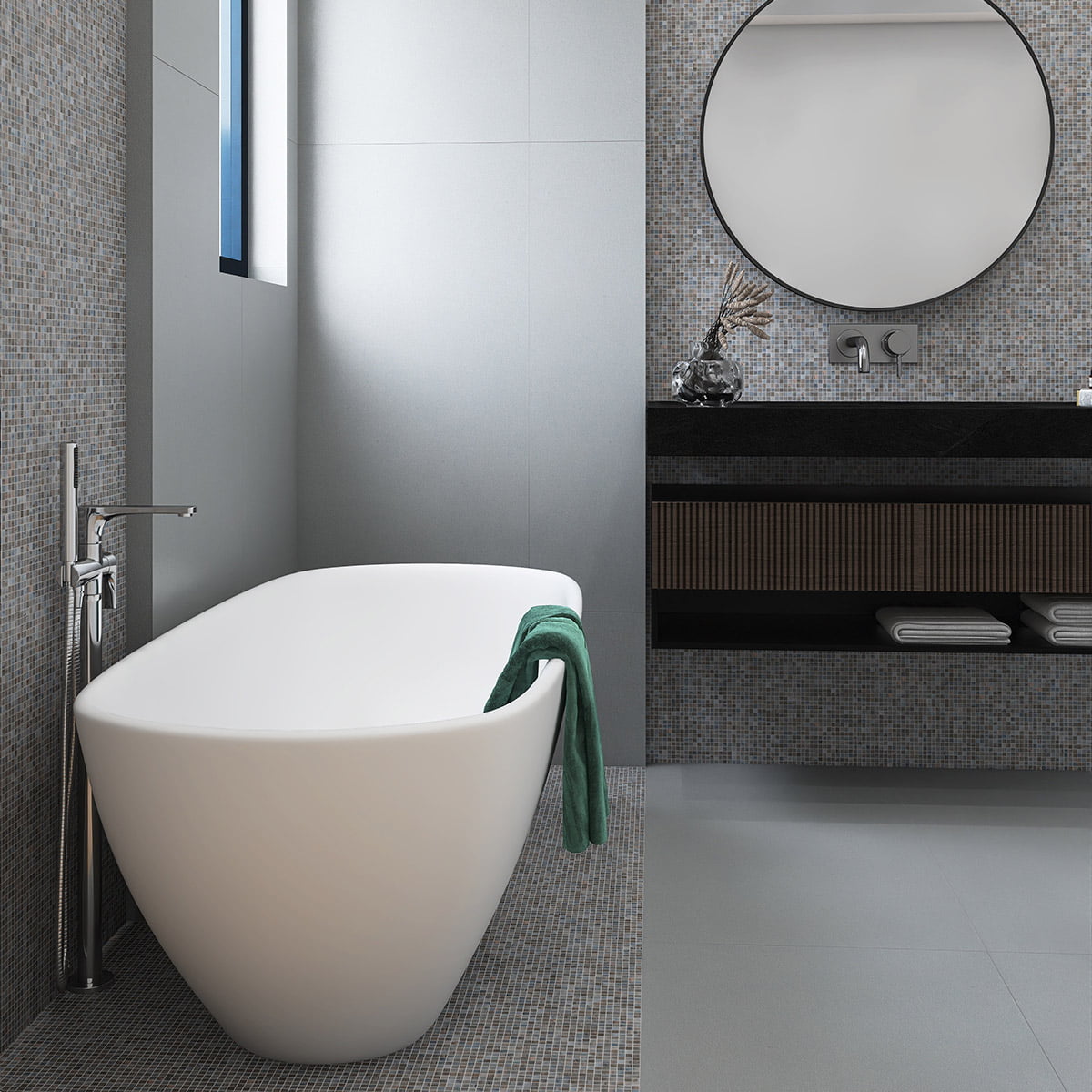 Minimalist bathroom with mosaic tile walls and floor paired with a sleek white soaking tub