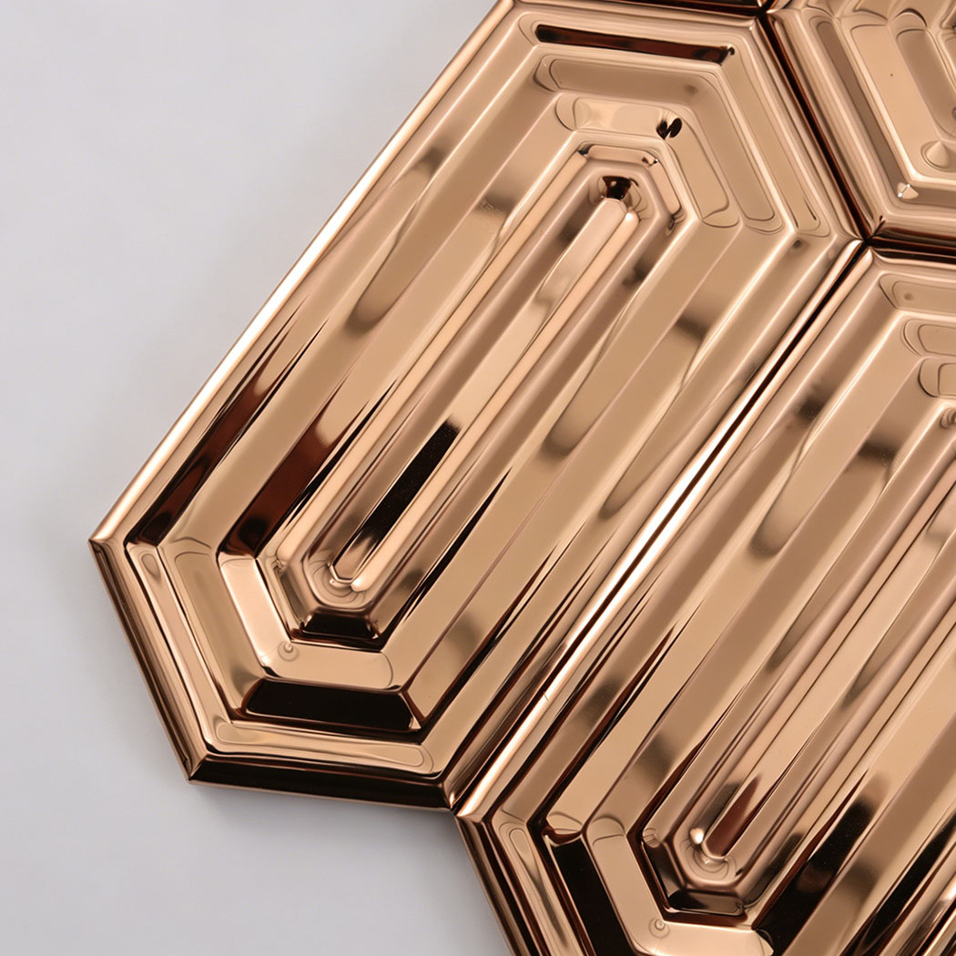 Close up mirror rose gold hexagon metal mosaic showing reflective metallic surface