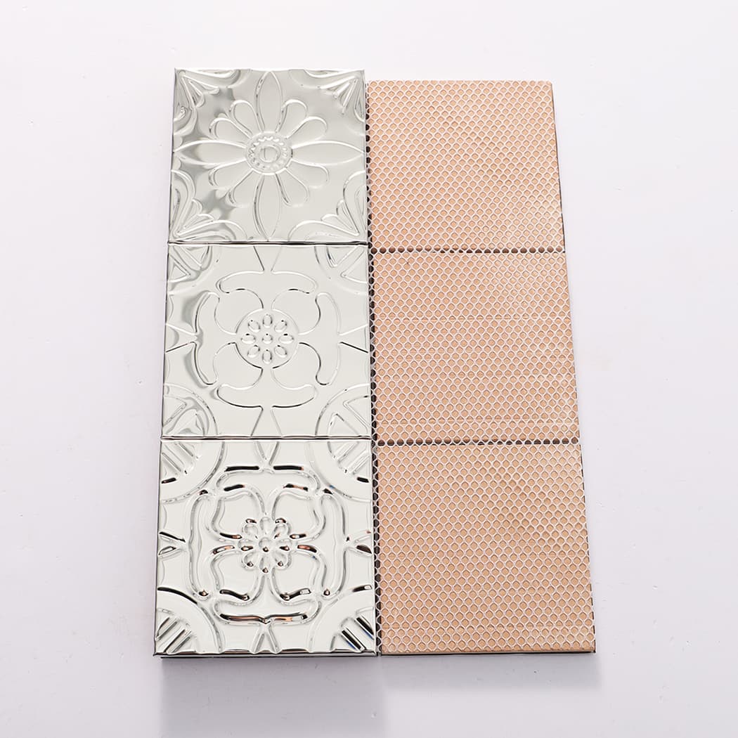 Mirror silver embossed mosaic tiles shown with mesh backing for easier alignment and installation.