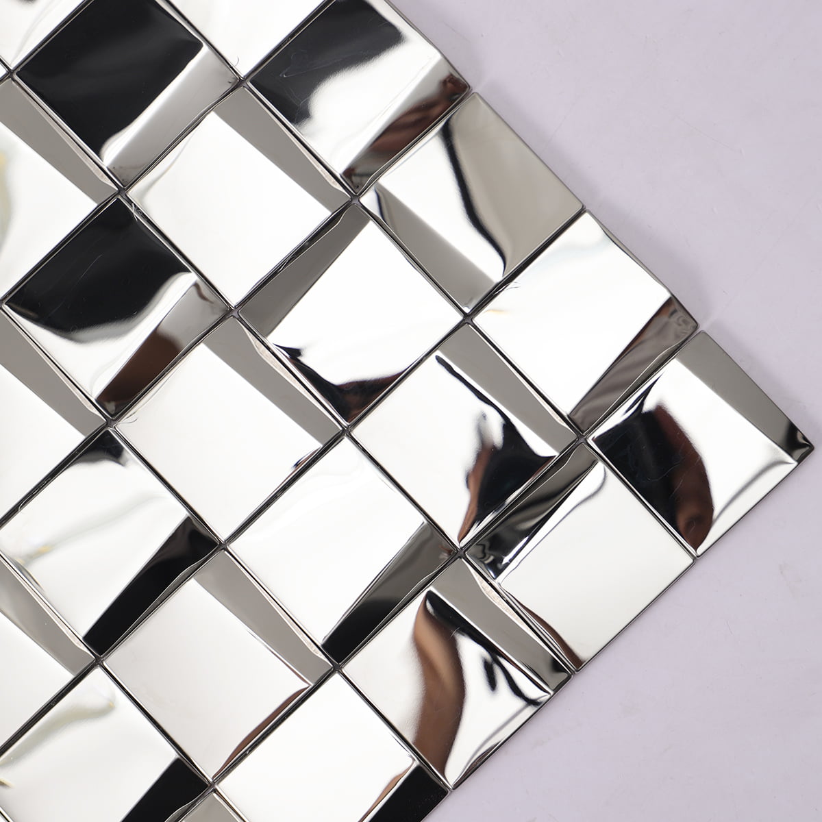 Mirror-like square mosaic tiles with polished finish in large arrangement