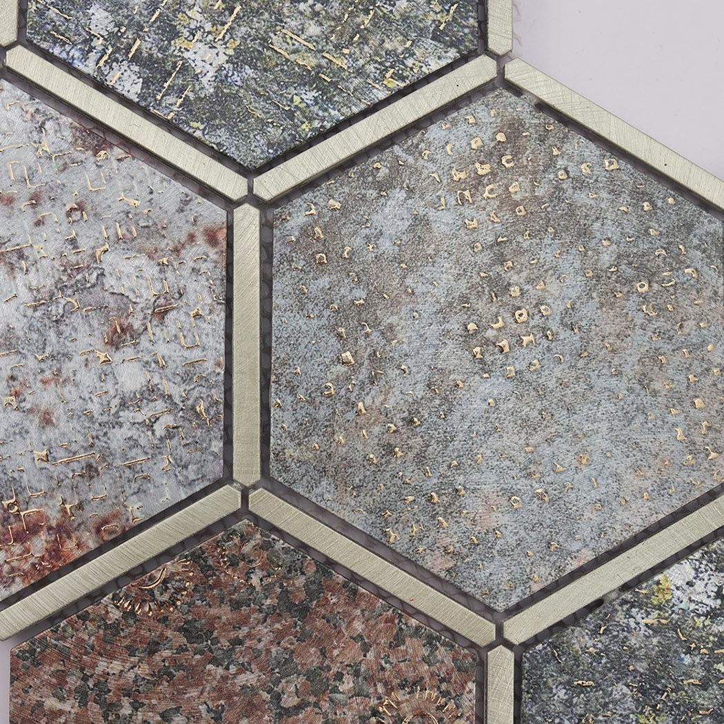Close-up of mixed grey and brown aluminum hexagon mosaic tile surface