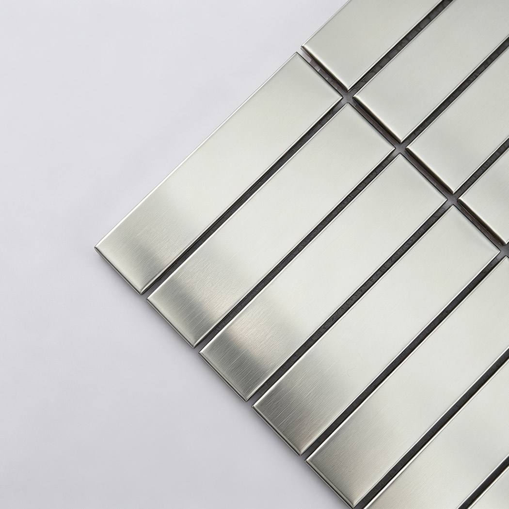 Close-up of a modern mosaic tile with a brushed silver finish