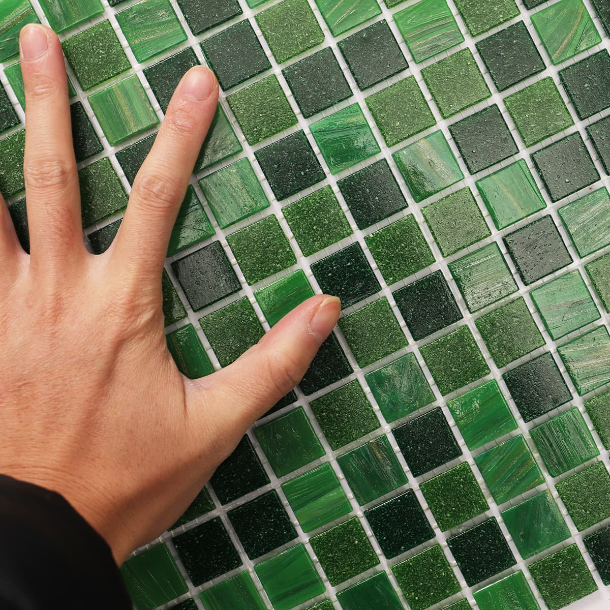 Mosaic tile sheet with green and darker green tiles arranged in a square grid