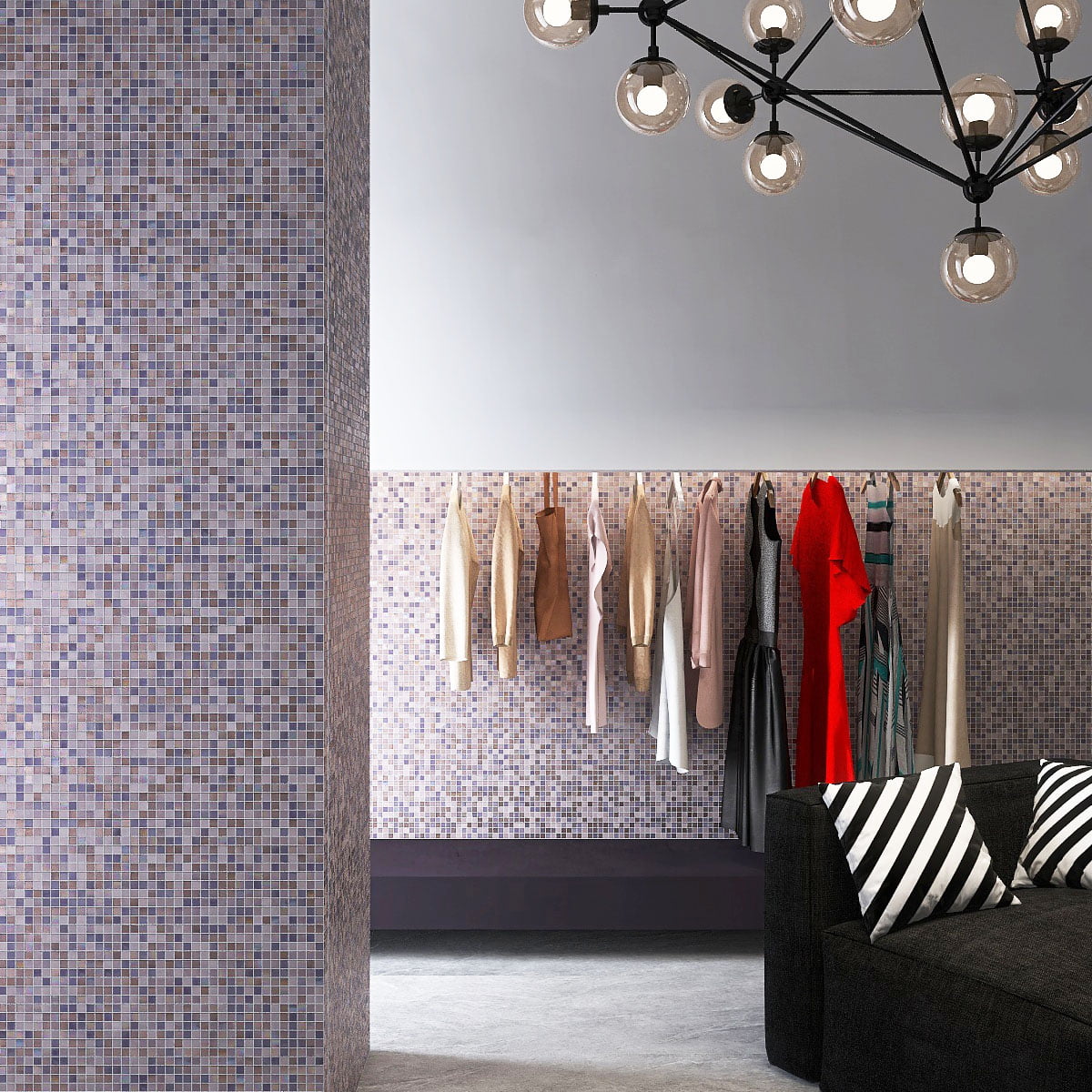 Mosaic tiled retail wall backdrop with clothing rack and modern decor