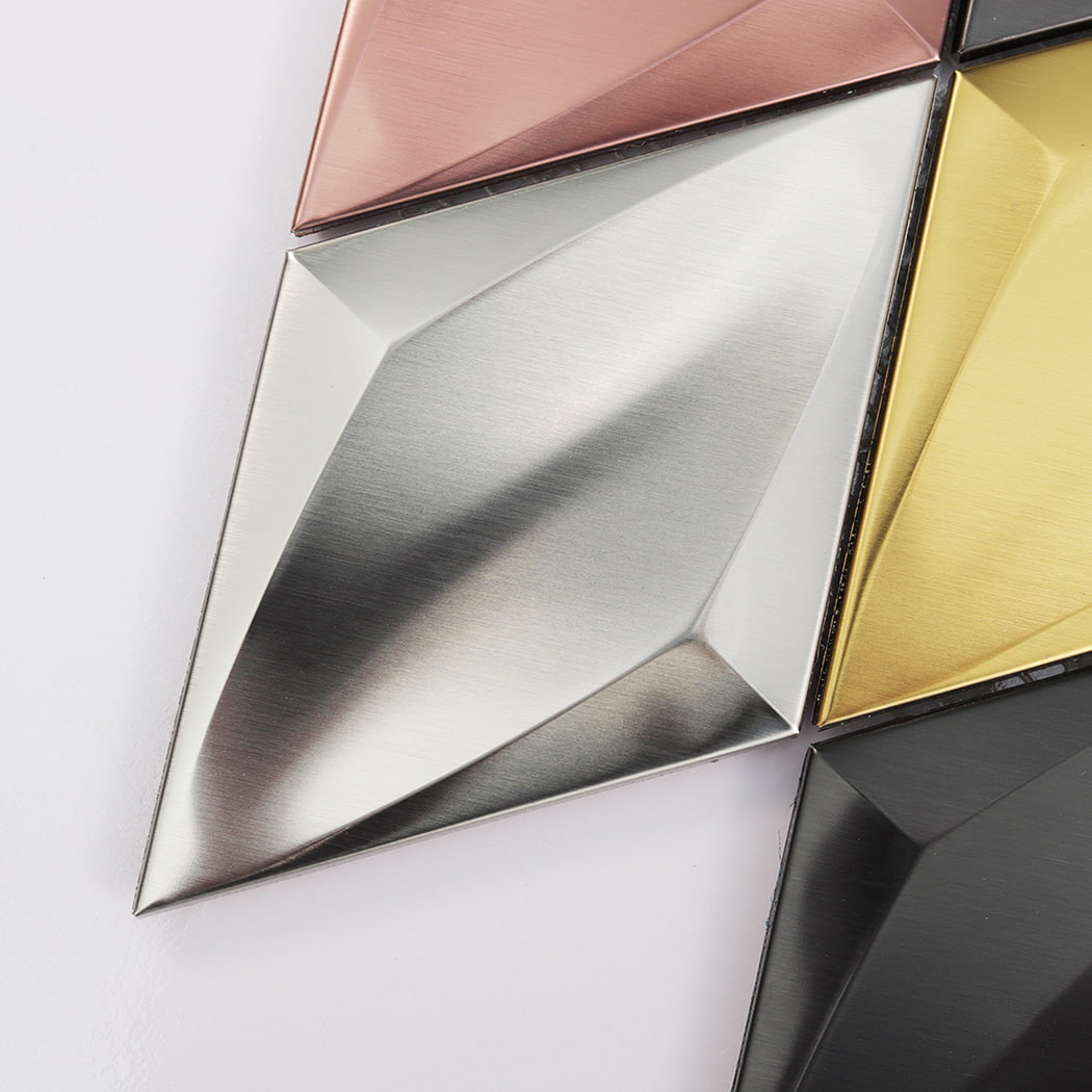 Side perspective showing the three-dimensional depth of diamond metal mosaic tiles.